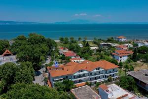 an aerial view of a town next to the water at Milies in Stavros