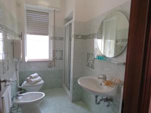 Koupelna v ubytování Appartamenti Tevere