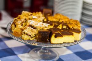 a plate of dessert on top of a table at Hotel Olivia in Gdańsk