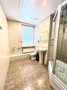 
Ванная комната в Отель Комфорт Класс
