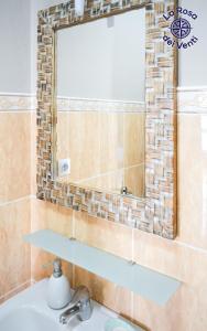 Koupelna v ubytování Rosa dei venti sea view - 4 persons - wifi free + 45 fotografií