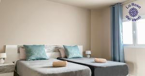 Postel nebo postele na pokoji v ubytování Rosa dei venti sea view - 4 persons - wifi free