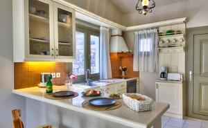 Kuchyň nebo kuchyňský kout v ubytování Mill Suites - Loggos