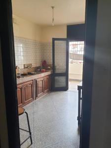 Η κουζίνα ή μικρή κουζίνα στο Chambre mignonne avec petite terrasse