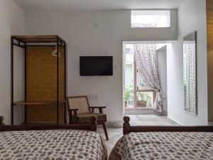 Postel nebo postele na pokoji v ubytování Mukam, Boutique Homestay + 37 fotografií