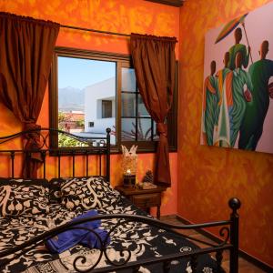 Ένα ή περισσότερα κρεβάτια σε δωμάτιο στο Los Amigos NEST hostel