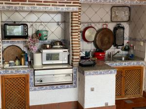 Кухня или мини-кухня в Estudio independiente cerro del águila
