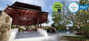 a pavilion next to a pool at a resort at Smile House - Fisherman Village in Bophut