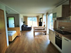 A kitchen or kitchenette at Ferienpark Gaal