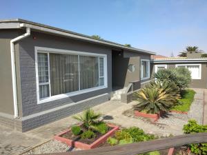 a house with a garden in front of it at 20 on Beach Road in Swakopmund