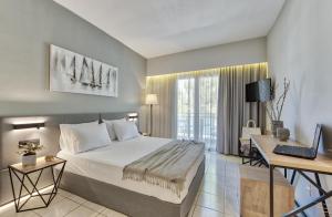Katil atau katil-katil dalam bilik di Contessa Hotel