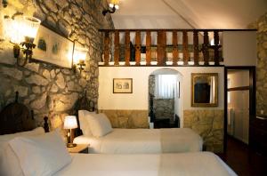 Säng eller sängar i ett rum på Casa do Ameal