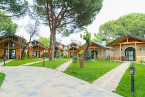 Zahrada ubytování Pino Mar Luxury Bungalows