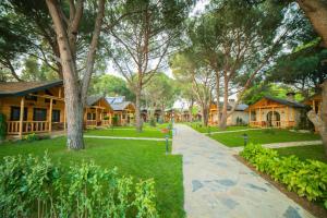 Zahrada ubytování Pino Mar Luxury Bungalows
