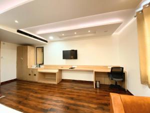 TV a/nebo společenská místnost v ubytování Hotel Pradeep Star Inn