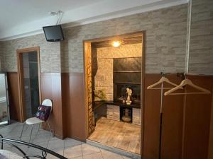 TV a/nebo společenská místnost v ubytování Al cervo tra i laghi