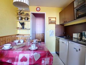 Kuchyň nebo kuchyňský kout v ubytování travelski home classic - Résidence Médian