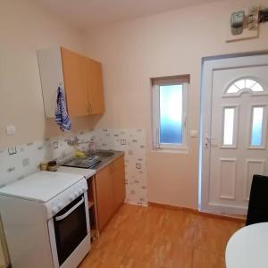 Kuchyň nebo kuchyňský kout v ubytování Apartman Ivona