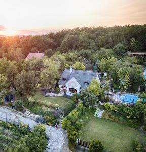 an aerial view of a house with a yard at Panorama Pool Residence in Balatonfüred