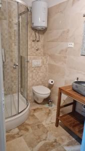 Kúpeľňa v ubytovaní Apartments Prižmić + 9 fotografií