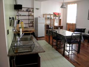 Una cocina o zona de cocina en Ampio Open Space in Centro Storico