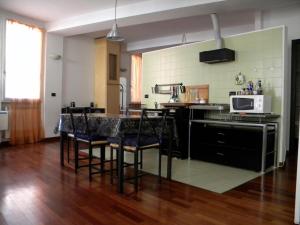 Una cocina o zona de cocina en Ampio Open Space in Centro Storico