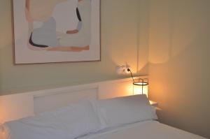 Madeinterranea Apartments客房内的一张或多张床位
