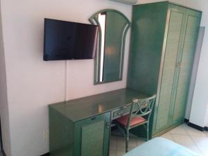 TV a/nebo společenská místnost v ubytování Hotel Blu Marlin + 13 fotografií