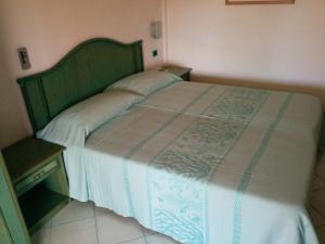 Postel nebo postele na pokoji v ubytování Hotel Blu Marlin