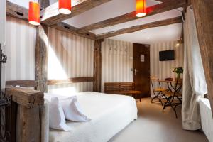 Ένα ή περισσότερα κρεβάτια σε δωμάτιο στο Odeon Hotel +90 φωτογραφίες