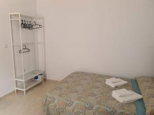 Apartamento PUERTO客房内的一张或多张床位