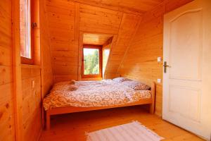 Postel nebo postele na pokoji v ubytování Holiday home Drveni Kutak