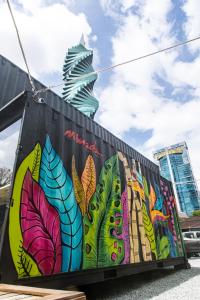 a mural on the side of a building at Nomada Republic Hotel Panama City in Panama City