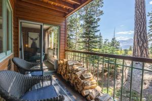 a screened in porch with a view of the mountains at Mountainback 15 in Old Mammoth