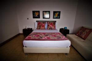 Voodi või voodid majutusasutuse Amazilia Hotel toas