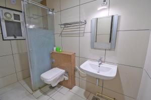 Kúpeľňa v ubytovaní Hotel Radiant Kolhapur