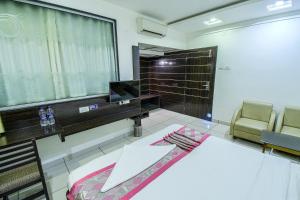 Posedenie v ubytovaní Hotel Radiant Kolhapur