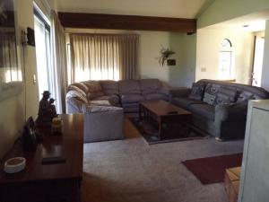 a living room with a couch and a table at Rr-edgewater01 in June Lake