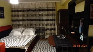 Posteľ alebo postele v izbe v ubytovaní Apartament Elegant