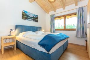 Posteľ alebo postele v izbe v ubytovaní Chalet Mandl Sauna Pool Rollstuhlgängig