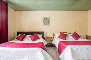 Llit o llits en una habitació de Touristic House