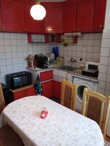 A kitchen or kitchenette at Апартамент Алекс