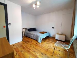 A bed or beds in a room at Ca Borines