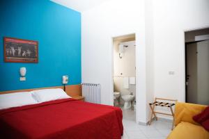 Postel nebo postele na pokoji v ubytování Hotel Calypso