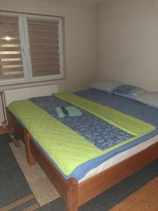 Кровать или кровати в номере Stari Grad Migy Travnik Apartman