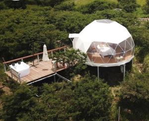 an aerial view of a gazebo with a gazebo at VíaLáctea Glamping in Loja