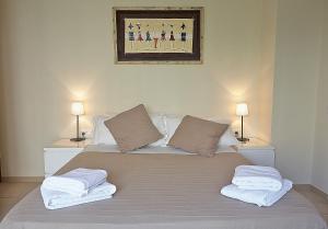 Posteľ alebo postele v izbe v ubytovaní Alguera Apartments Sant Andreu