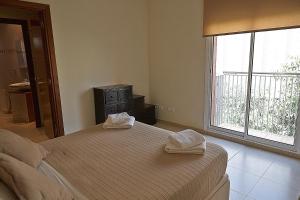 Posteľ alebo postele v izbe v ubytovaní Alguera Apartments Sant Andreu
