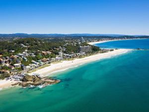 an aerial view of a beach and the ocean at The Rocks Resort Unit 5D in Gold Coast