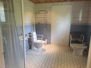 Koupelna v ubytování Wannborga Vingård